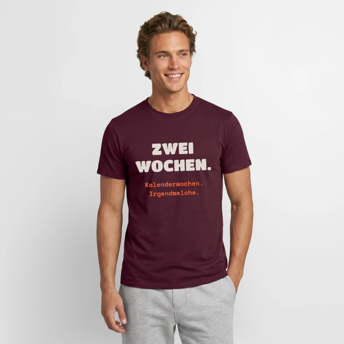 "Zwei Wochen. Kalenderwochen. Irgendwelche." Motiv-T-Shirt für Männer, Farbe Ziegelrot