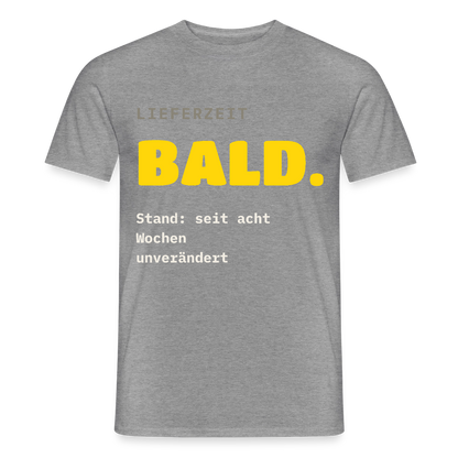 "Lieferzeit: bald. Stand: seit acht Wochen unverändert." Motiv-T-Shirt für Männer, Farbe Graphit meliert