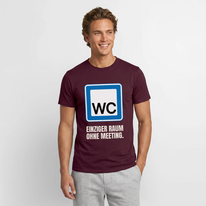 "WC: einziger Raum ohne Meeting." Motiv-T-Shirt für Männer, Farbe Ziegelrot