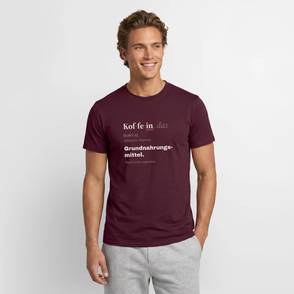 "Koffein, das: Grundnahrungsmittel." Motiv-T-Shirt für Männer, Farbe Ziegelrot