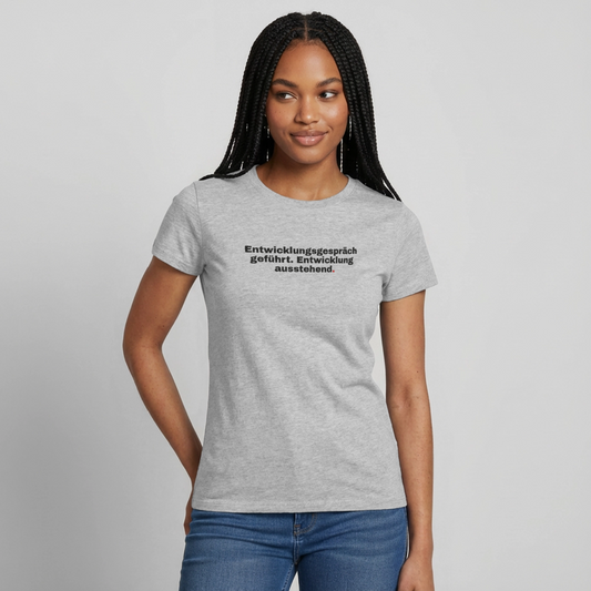 Entwicklungsgespräch geführt. Entwicklung ausstehend. Motiv-T-Shirt für Frauen, Farbe Grau meliert, Model