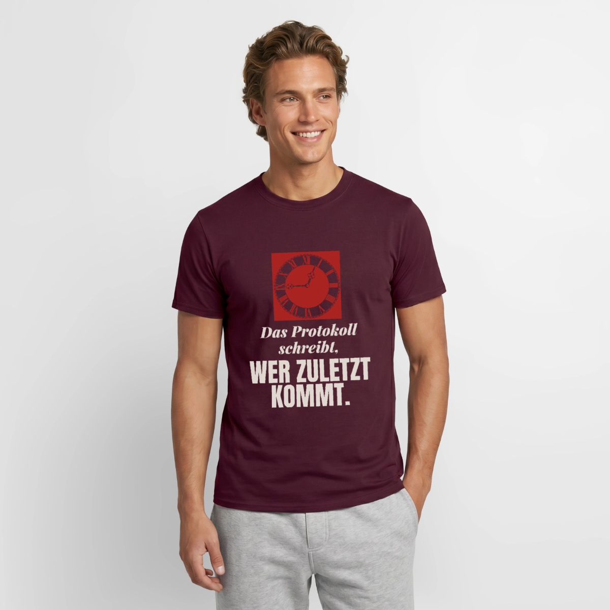 "Das Protokoll schreibt, wer zuletzt kommt." Motiv-T-Shirt für Männer, Farbe Ziegelrot