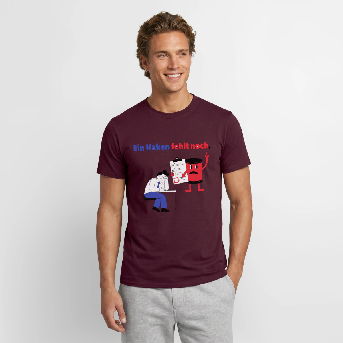 "Ein Haken fehlt noch. Comic-Motiv" Motiv-T-Shirt für Männer, Farbe Ziegelrot