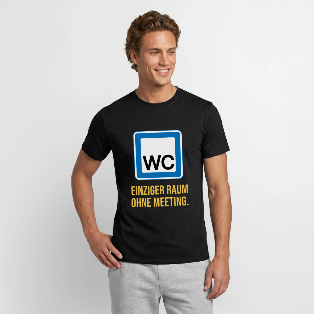 "WC: einziger Raum ohne Meeting. Schild-Motiv" Motiv-T-Shirt für Männer, Farbe Schwarz