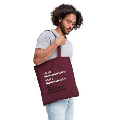 "Kick-off: Motivation 100 %. Woche 3: 40 %. Woche 6: siehe Kick-off nächstes Jahr" Stoffbeutel, Farbe Burgunderrot
