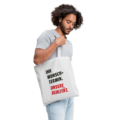 "Ihr Wunschtermin. Unsere Realität." Stoffbeutel, Farbe Weiß