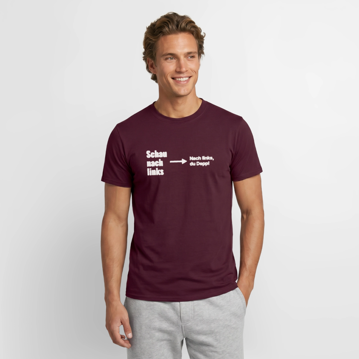 Schau nach links. Motiv-T-Shirt für Männer, Farbe Ziegelrot, Model