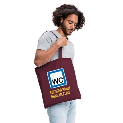 "WC: einziger Raum ohne Meeting. Schild-Motiv" Stoffbeutel, Farbe Burgunderrot