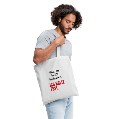 Führen heißt loslassen. Ich halte fest. Stoffbeutel, Farbe Weiß, Model