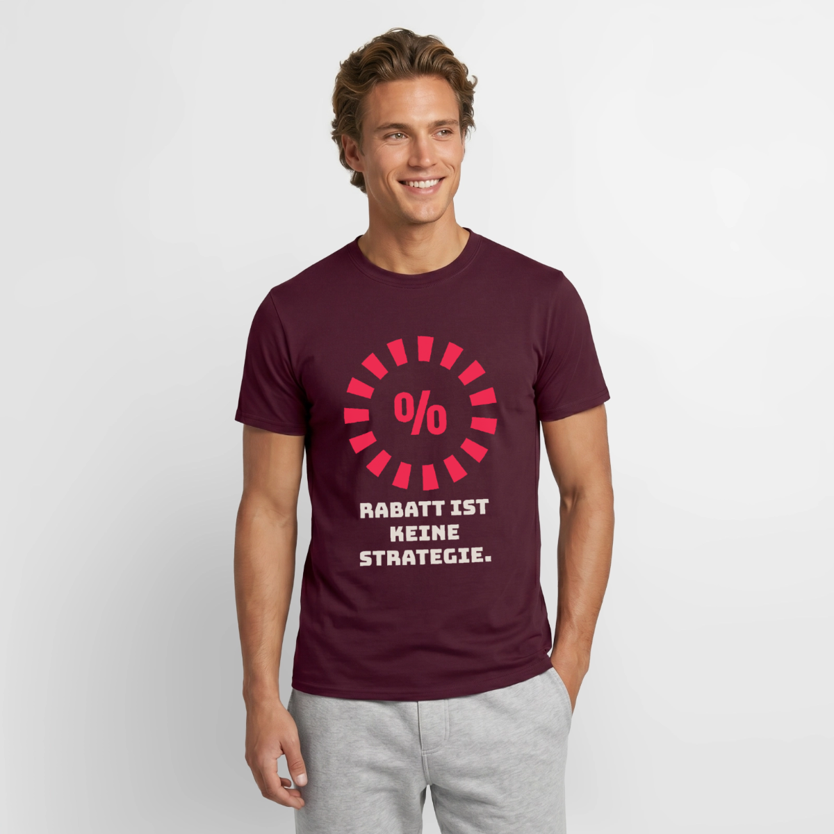 "Rabatt ist keine Strategie." Motiv-T-Shirt für Männer, Farbe Ziegelrot
