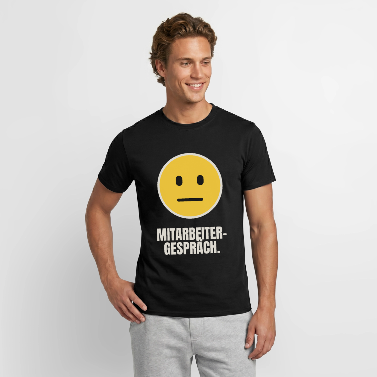 "Mitarbeitergespräch." Motiv-T-Shirt für Männer, Farbe Schwarz, Model