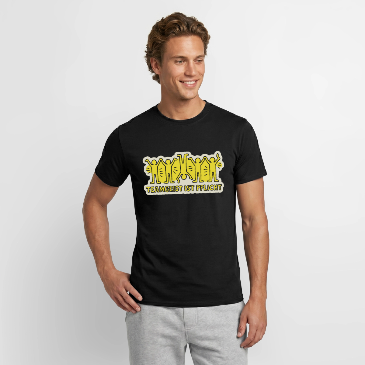 "Teamgeist ist Pflicht. Pop-Art-Motiv" Motiv-T-Shirt für Männer, Farbe Schwarz, Model