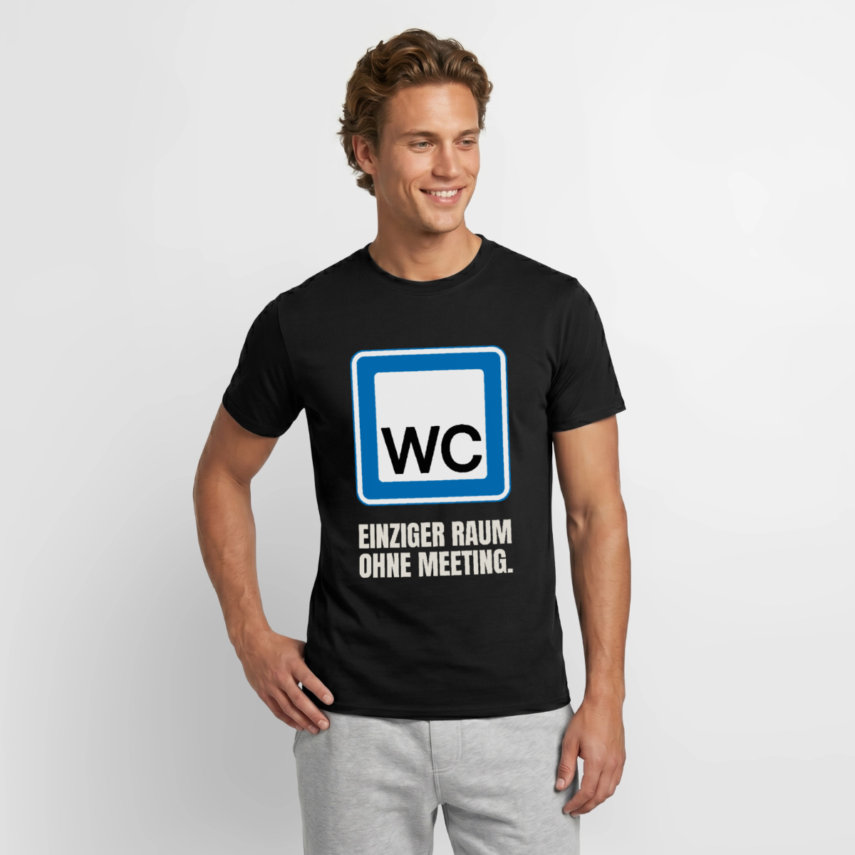 "WC: einziger Raum ohne Meeting." Motiv-T-Shirt für Männer, Farbe Schwarz