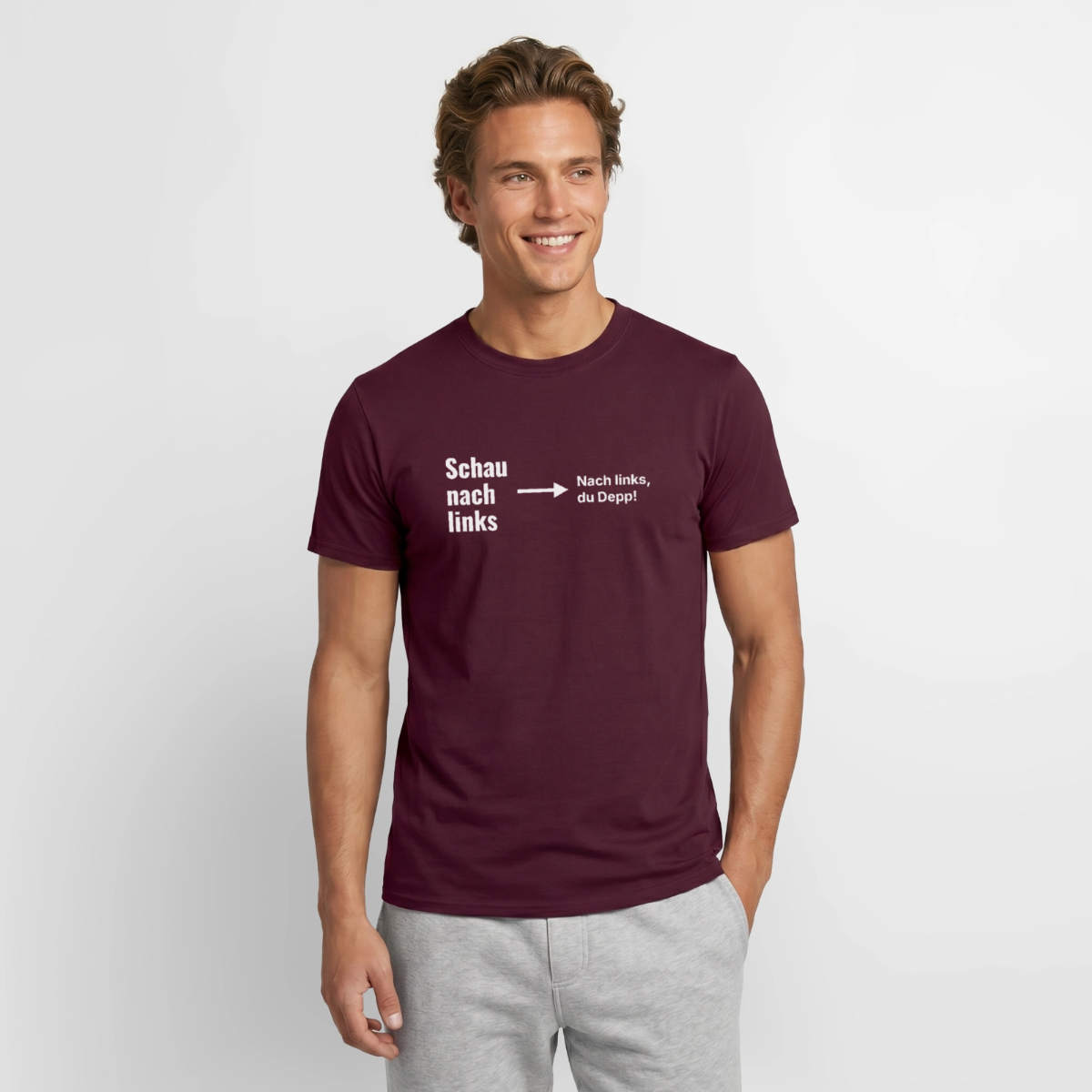 Schau nach links. Typo-Motiv Motiv-T-Shirt für Männer, Farbe Ziegelrot, Model