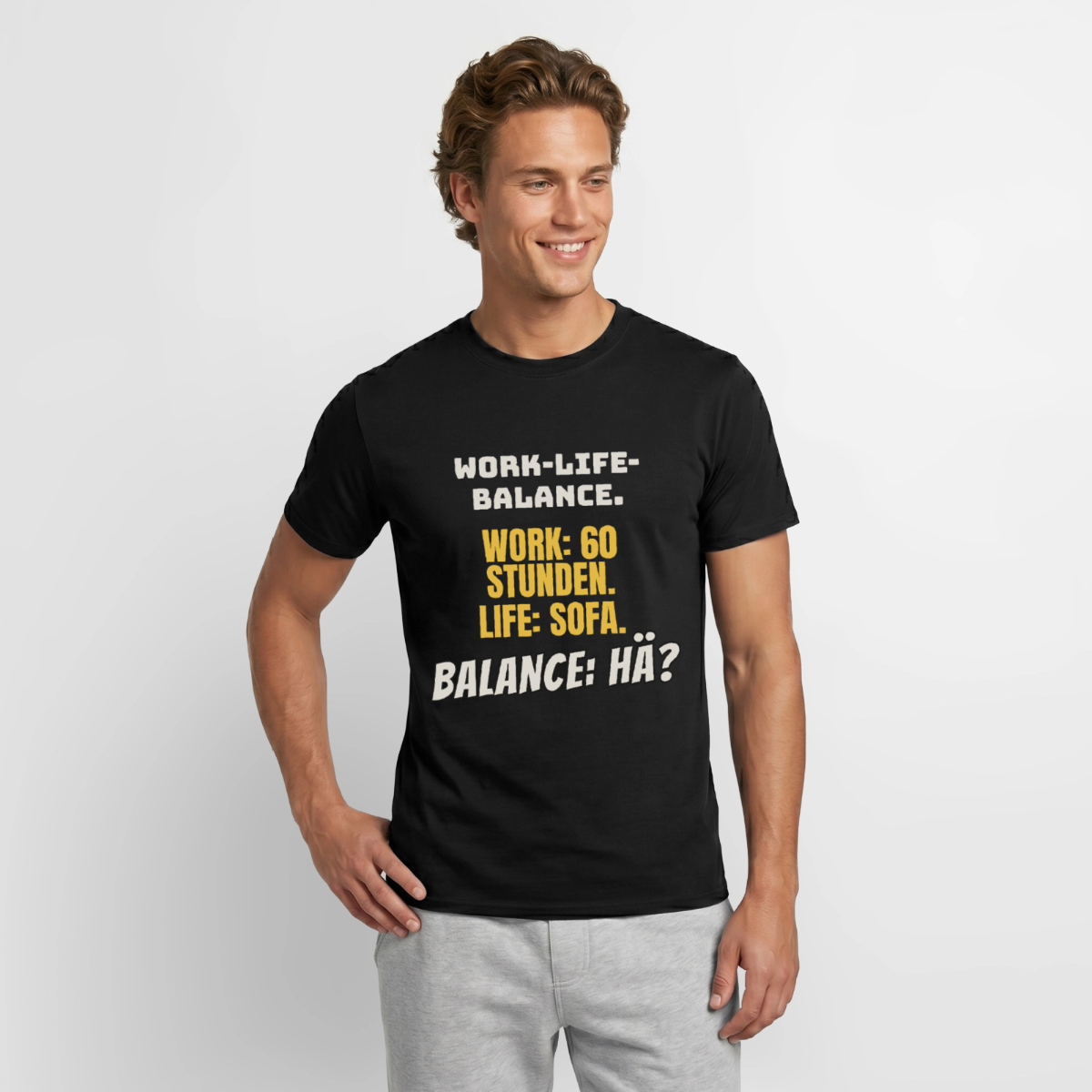 "Balance: hä?" Motiv-T-Shirt für Männer, Farbe Schwarz, Model