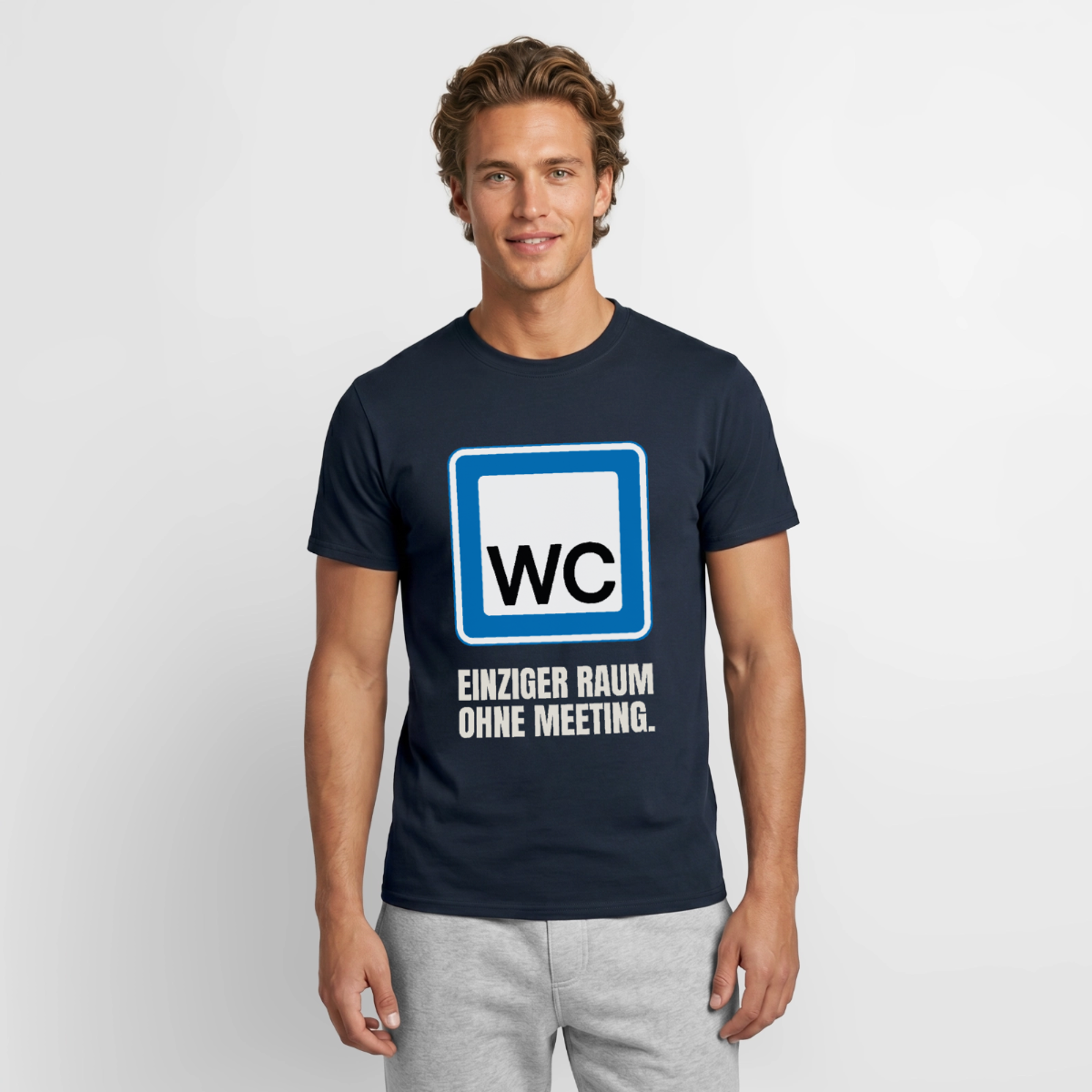 "WC: einziger Raum ohne Meeting." Motiv-T-Shirt für Männer, Farbe Navy