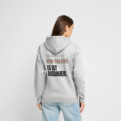 Verkaufen ist kein Talent. Es ist Ausdauer. Motiv-Hoodie unisex, Farbe Hellgrau meliert, Model