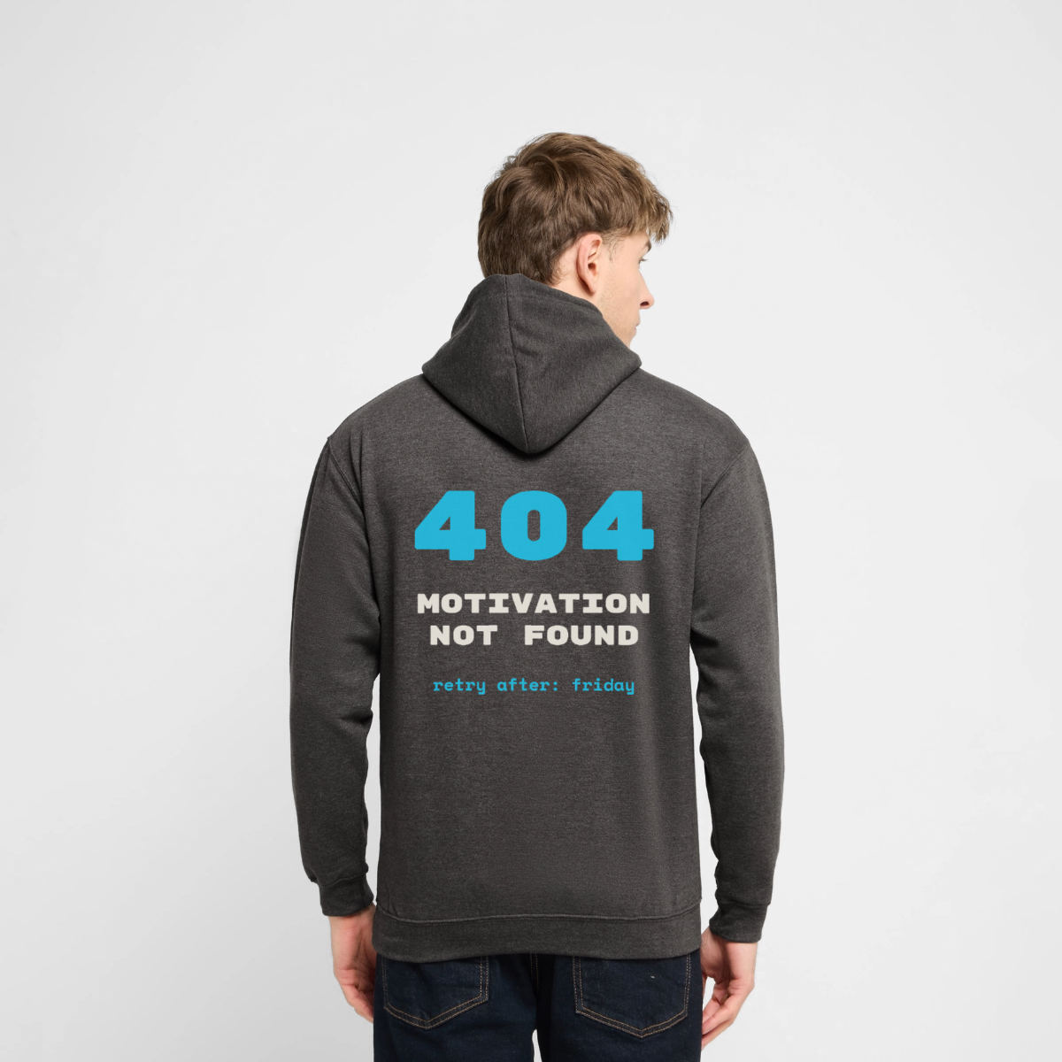 "404 Motivation not found. Retry after: friday" Motiv-Hoodie unisex, Farbe Anthrazit, Model