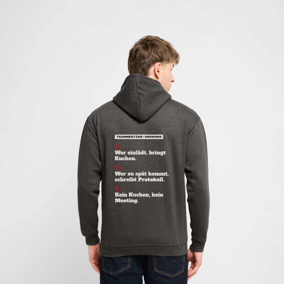 Teammeeting-Ordnung: wer einlädt, bringt Kuchen. Motiv-Hoodie unisex, Farbe Anthrazit, Model