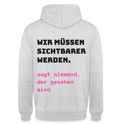 Wir müssen sichtbarer werden. Sagt niemand, der gesehen wird. Motiv-Hoodie unisex, Farbe Hellgrau meliert